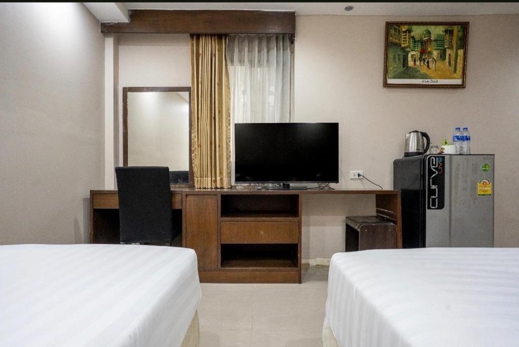 IRAQI HOTEL IRAQI HOTEL